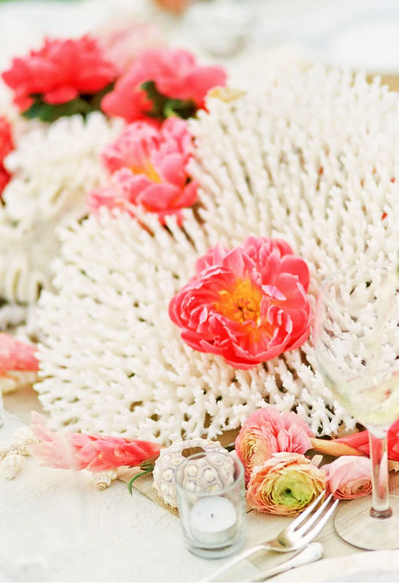 Beach wedding décor idea: White sea coral White coral with pink peonies on wedding tables