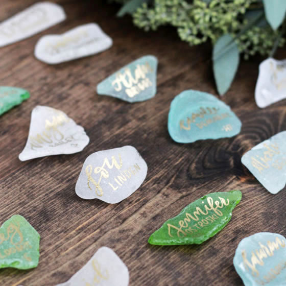 Beach wedding décor idea: Sea glass place cards Sea glass wedding place cards
