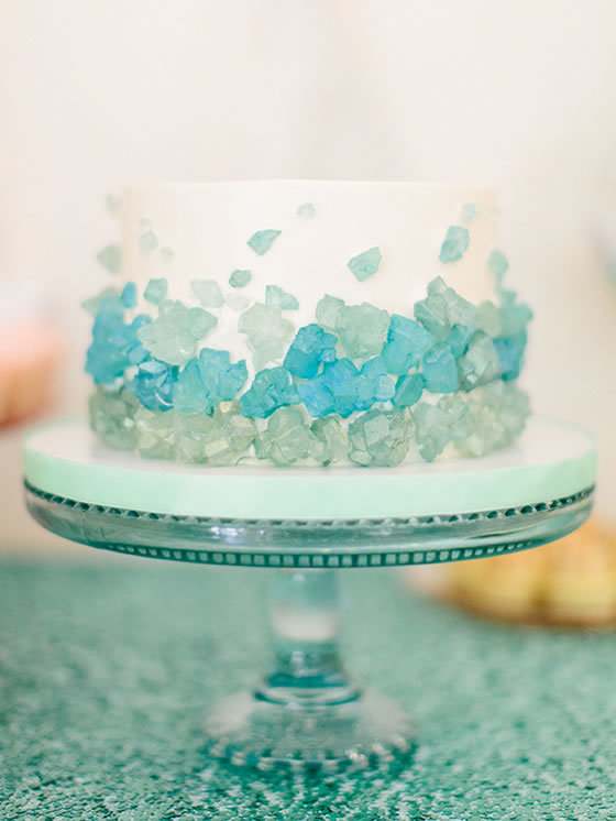 Beach wedding décor idea: Sea glass wedding cake Wedding cake with sea glass rock candy