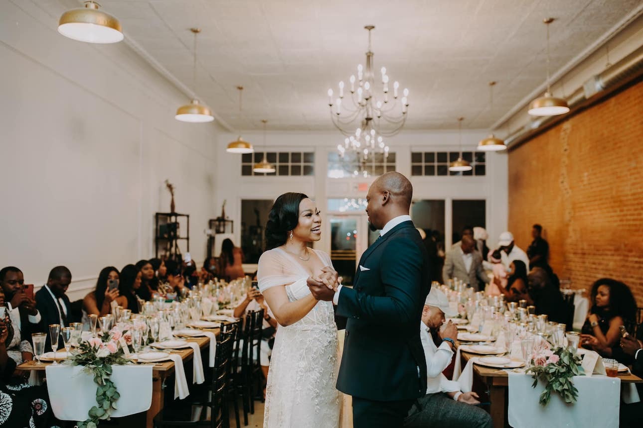 Newlyweds dance at their intimate wedding reception at The Space on West Main