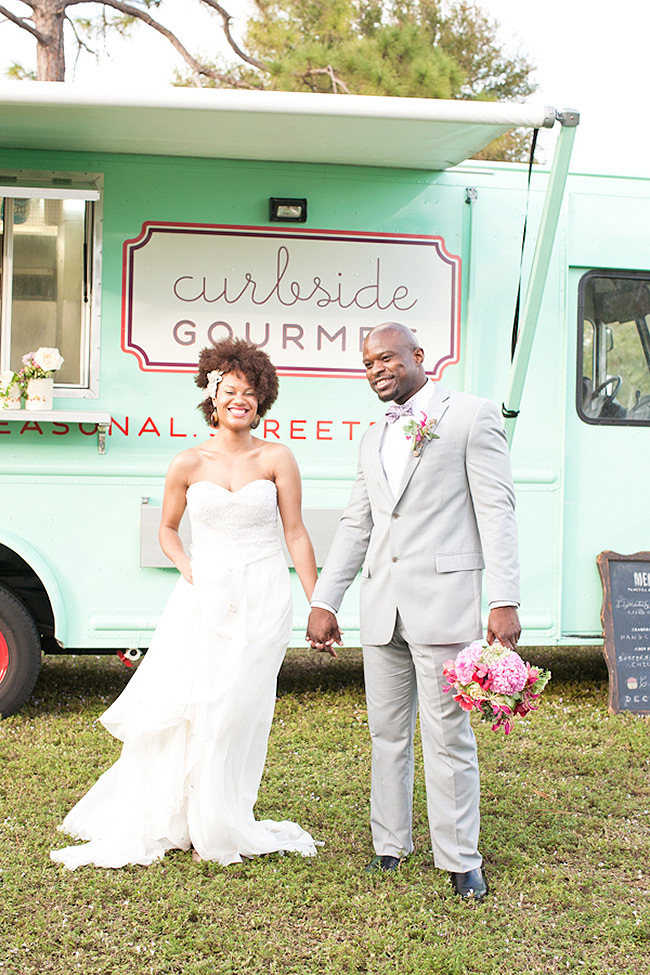 Small Wedding Ideas | Adorable newlyweds smile in front of a food truck Small Wedding Ideas | Adorable newlyweds smile in front of a food truck