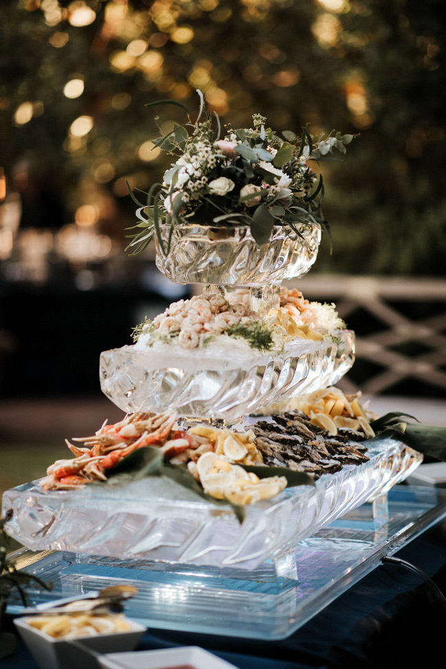 Small Wedding Ideas | Splurge on food, like this fancy seafood tower ice sculpture Small Wedding Ideas | Splurge on food, like this fancy seafood tower ice sculpture