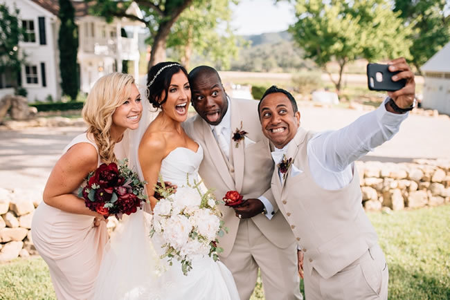 Wedding party takes a selfie Wedding party takes a selfie