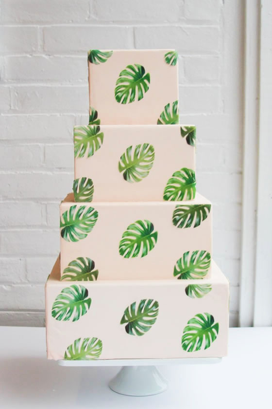 Beach wedding décor idea: Monstera leaf wedding cake Monstera leaf printed wedding cake
