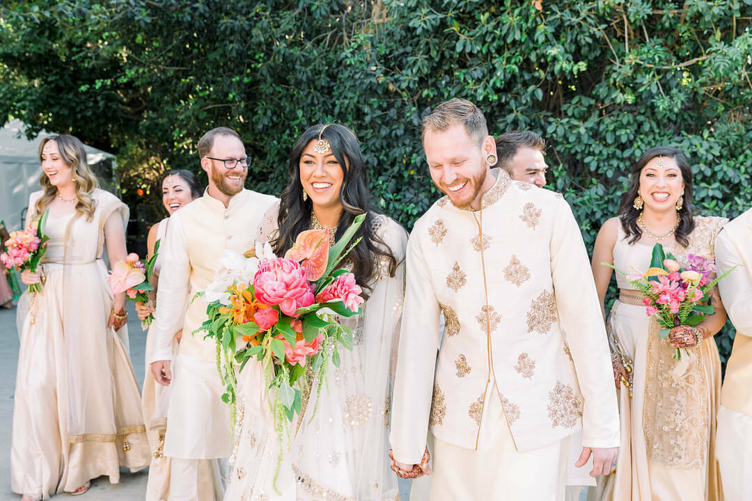 Lovely wedding party with tropical bouquets | Wedding To-Do List and Timeline by Here Comes The Guide