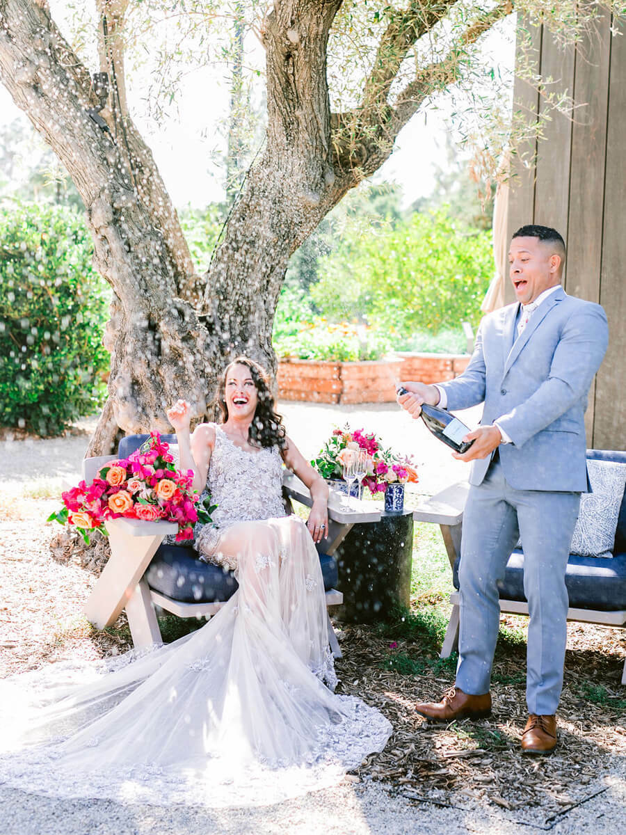 Pop champagne | Wedding Checklist and Timeline by Here Comes The Guide