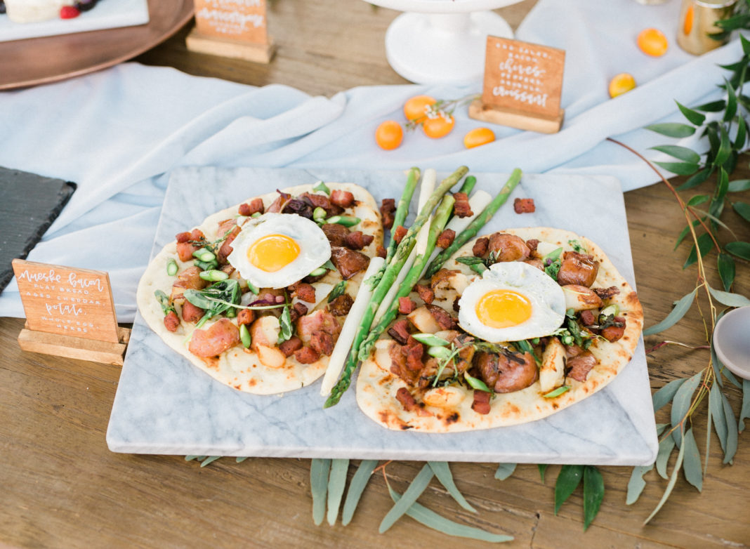 Wedding brunch featuring bacon and egg flatbread by Colette's Events