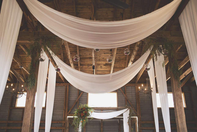 Weddings in North Georgia | Overhead drapery frames a wedding ceremony at The Corner District Weddings in North Georgia | Overhead drapery frames a wedding ceremony at The Corner District