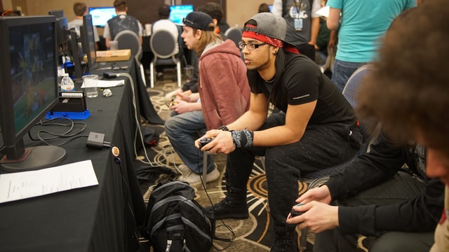 People playing games at a gaming event