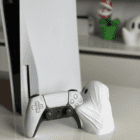 ps5 controller accessory ghost stand next to console