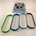 Desk-mounted game controller stand for Xbox, 3D printed in two-tone plastic