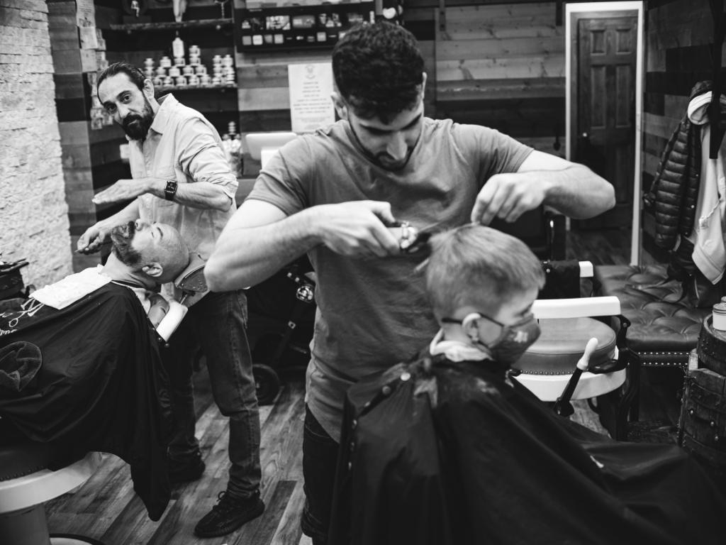 Are there any specific products recommended for styling and maintaining a fade haircut?