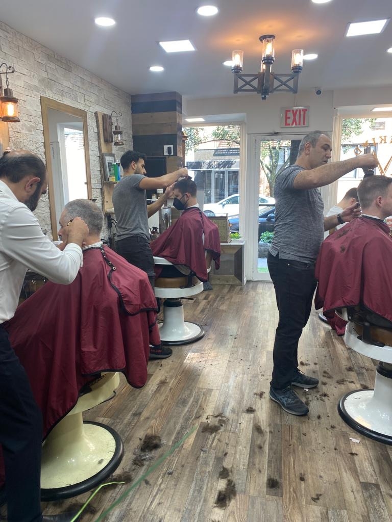 How often should someone with a low skin fade and comb over haircut visit the barber for maintenance?