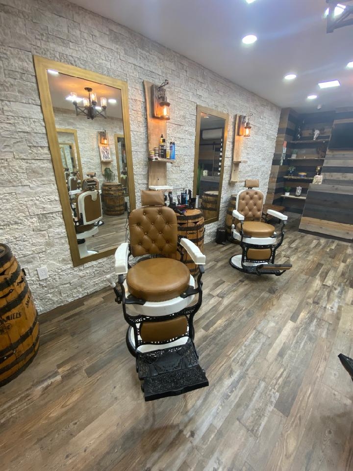 How often should someone with a taper fade and side sweep hairstyle visit the barber for maintenance?