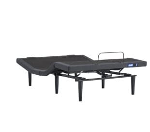 A modern adjustable bed frame with a dark fabric-covered base, raised head and leg sections, and sturdy black legs, shown on a white background.