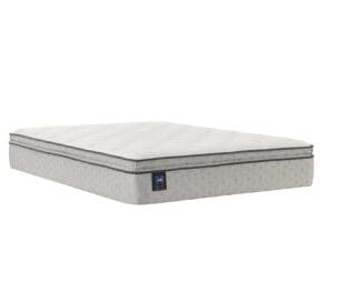 A light gray mattress with a quilted top and dark gray trim sits on a white background. The mattress appears plush and has a small rectangular brand label on the lower corner.