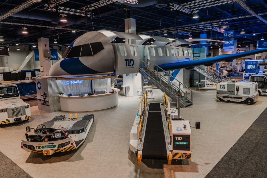TLD double-deck airplane exhibit at the International GSE Expo 2025 designed and built by Absolute Exhibits