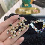 Chanel Combinating White And Black Pearl Earrings Gold Tone For Women