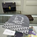 Dior Pompom Beanie In Grey