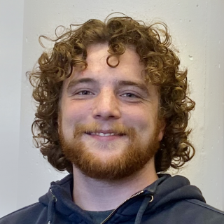 man with curly hair