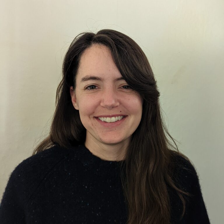 smiling woman in black