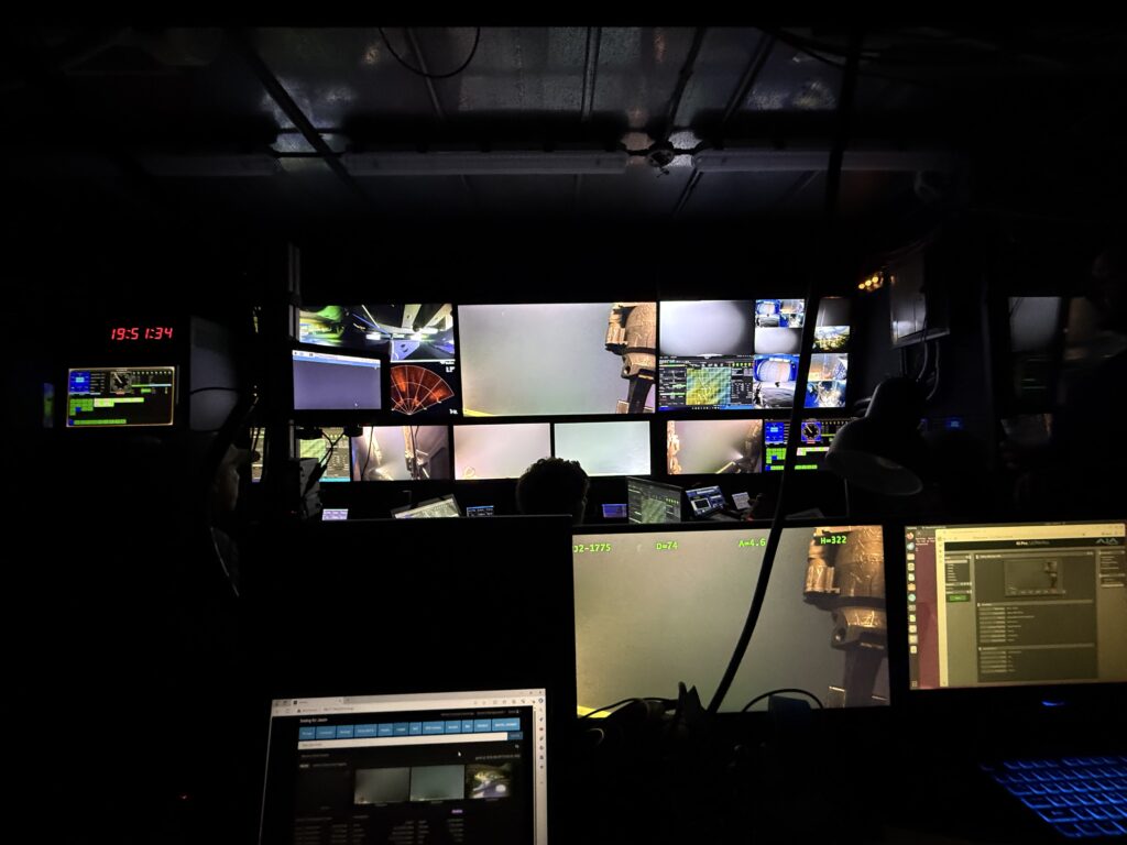 Inside of the Jason control van showing an amazing number of monitors during dive J2-1775. Credit: A. Chang, University of Washington; V26