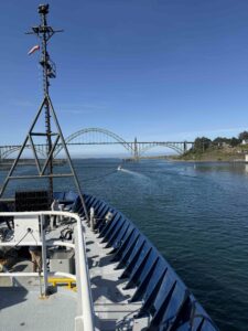 R/V Revelle leaving port in Newport, Oregon. Credit: J Campbell, University of Washington; V26.
