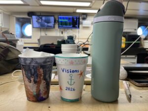My styrofoam cups before they descend down and compress, water bottle for scale. Credit: A. Wolf, University of Washington; V26.