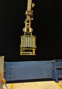 A CTD goes over the side in the darkness of early morning.