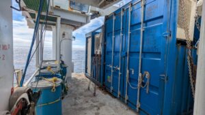 Entrance to the Jason control van on the O1 deck of R/V Roger Revelle during a rare break in the clouds.