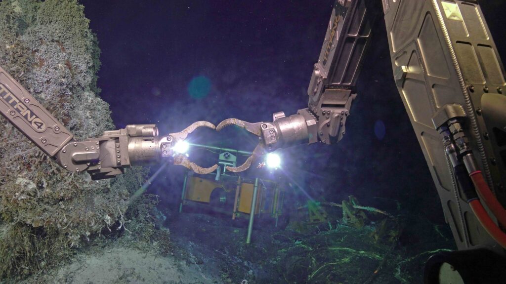 The ROV Jason sends its love from a mile beneath the oceans surface, watched live by the HD camera from shore. Credit: UW/NSF-OOI/WHOI; J2-1784, V26.
