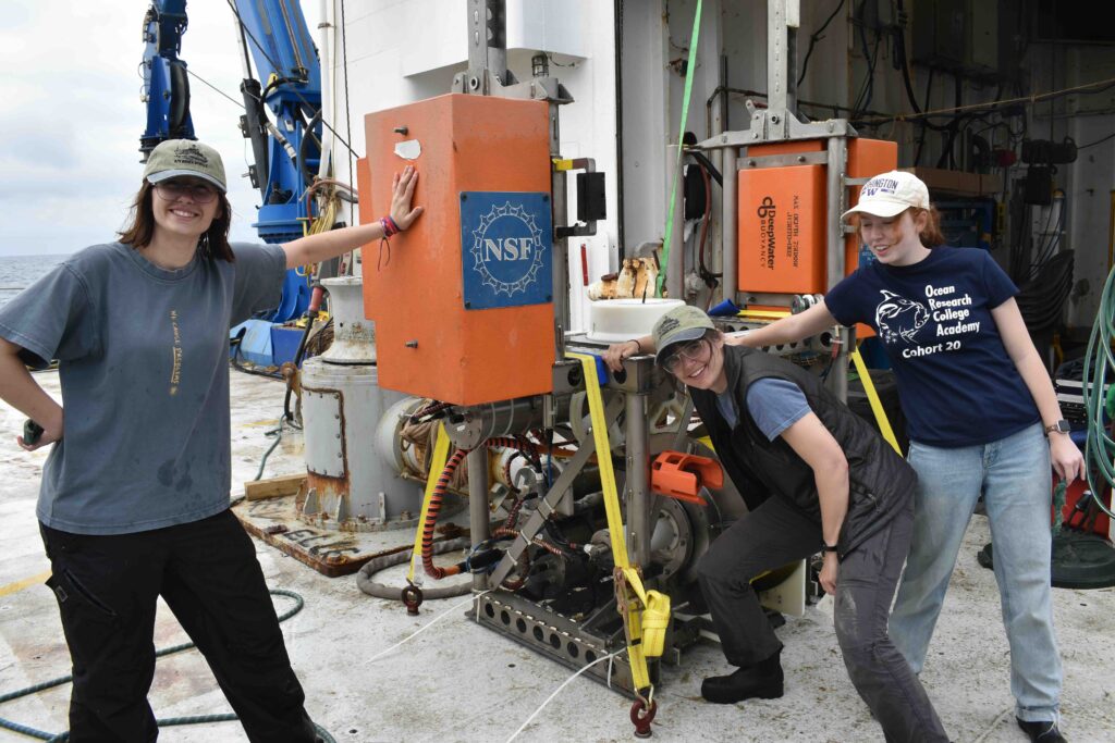 VISIONS'26 students Izzie Fatland, Maddie Talbot, and Avery Wolf show off their handy work after cleaning a Shallow Profier Science Pod Controller recovered by Jason. Credit: J. Thrityacre, University of Washington, V26.