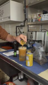 Joe adding his second shot of espresso to his Sproton. Credit: A. Chang, University of Washington; V26.
