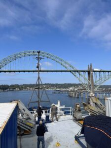 The R/V Revelle heading under the Yaquina Bridge. Credit: A. Wolf, University of Washington; V26.