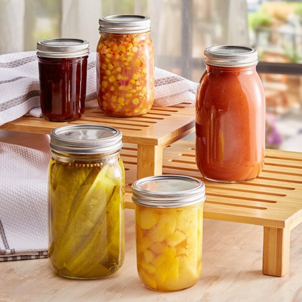 Choice 16 oz. Pint Wide Mouth Canning / Mason Jar with Silver Metal Lid and Band - 12/Case