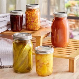 Choice 16 oz. Pint Wide Mouth Canning / Mason Jar with Silver Metal Lid and Band - 12/Case