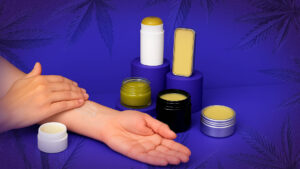 Man applying CBD Balm products for pain relief