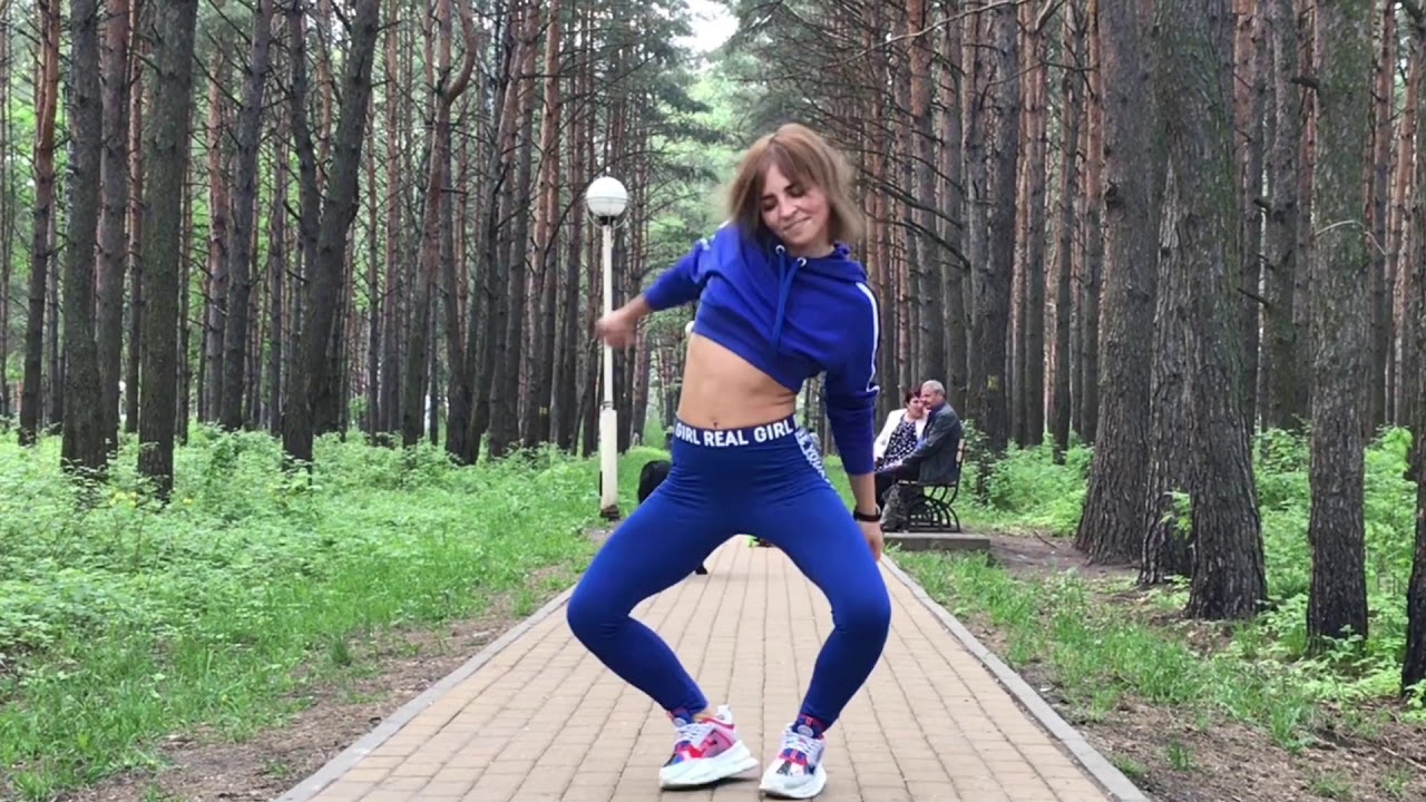 Tasya dancing in blue outside