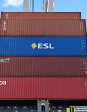 a container in a stack on a vessel with the ESL logo 
