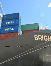 ESL containers and the vessel while looking up from the terminal