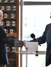 Port of Walla Walla Commissioner Kip Kelly (L) shakes the hand of Port of Pasco Commissioner Hans-Joachim Engelke during a signing ceremony in Olympia for an interlocal agreement to develop an Inland Logistics Hub in southeastern Washington on Thursday, February 5, 2026. 