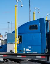 Multiple trucks are seen as they go through the new gate complex at Terminal 5 in Seattle. The modernized gate complex doubles the on-terminal truck queuing capacity at Terminal 5.