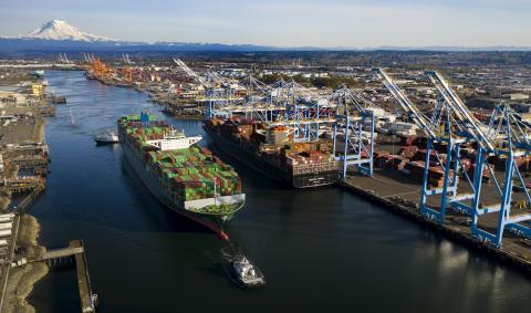 A tug pulling a big ship