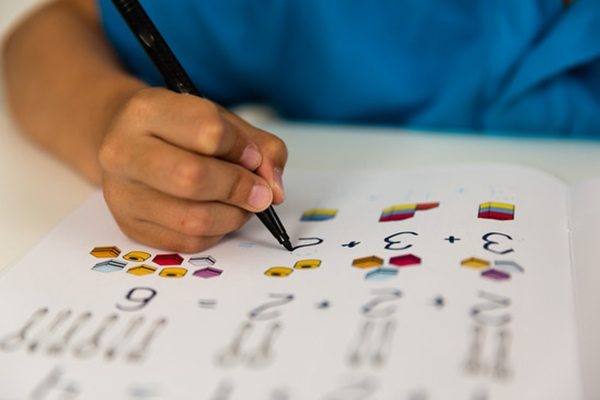 Boy doing homework math tutoring seattle