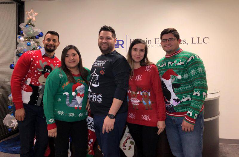 The Law Office of Edwin E. Reyes firm staff celebrating Christmas