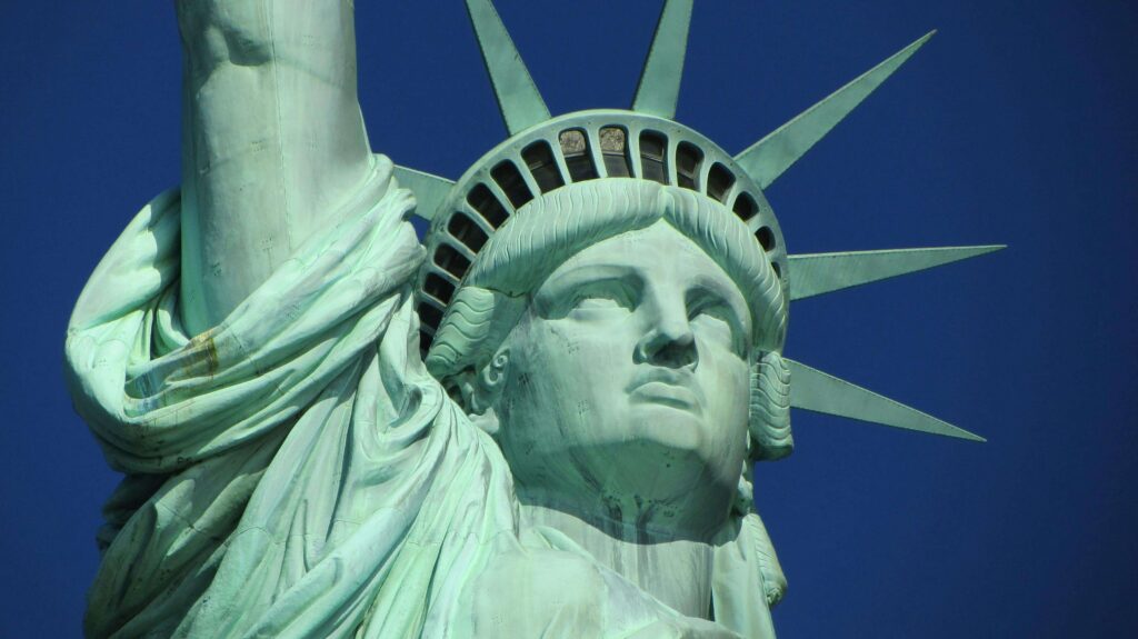 The Statue of Liberty, a symbol of freedom, welcomed millions of immigrants to the U.S. at the beginning of their journey to citizenship after it was unveiled in 1886. The statue remains a symbol welcoming all immigrants on their path to legal citizenship via a green card or visa.
