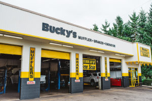 Car being repaired in 4 car garage at Bucky's Renton Auto Repair