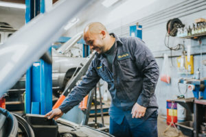 mechanic starting diagnostic at Bucky's Midway Auto Repair