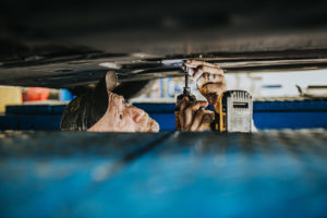 mechanic reassembling car at Bucky's Auto repair puyallup