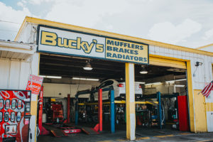 WRX on lift at Bucky's Fife Auto Repair